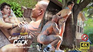 Outside Edith's tumbledown cabin we hear the lumbering steps of scary Jason. Looking up, Levy Foxx exclaims "I'll do anything!" and drops to his knees to suck the tatted madman's big hard dick.